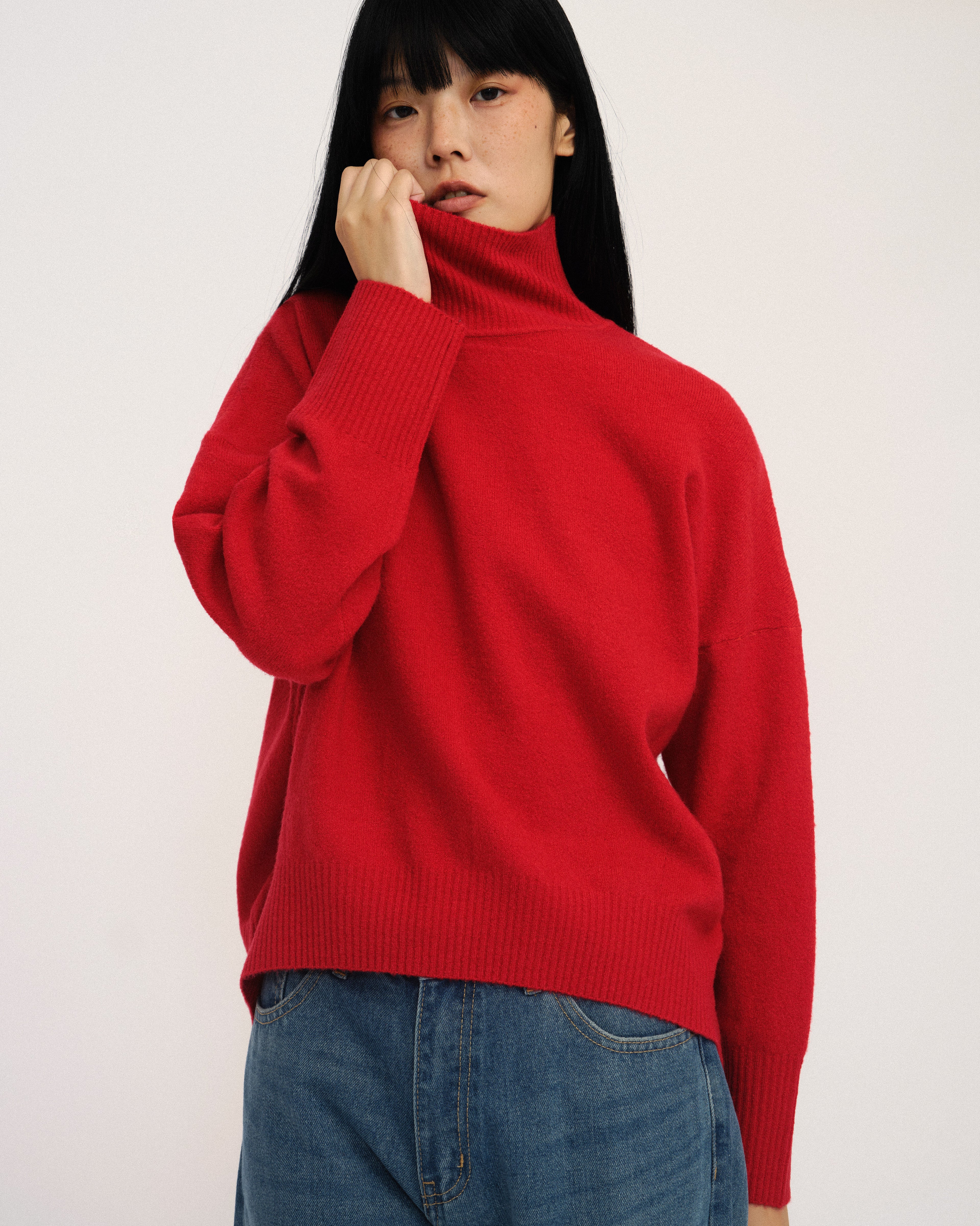 Nest Turtle Neck Knit Top